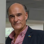 Dr. Carlos E. Lanusse